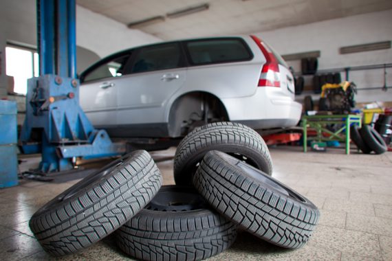 A stack of 4 tyres about to be fitted to a Volvo at Tyresave Machester